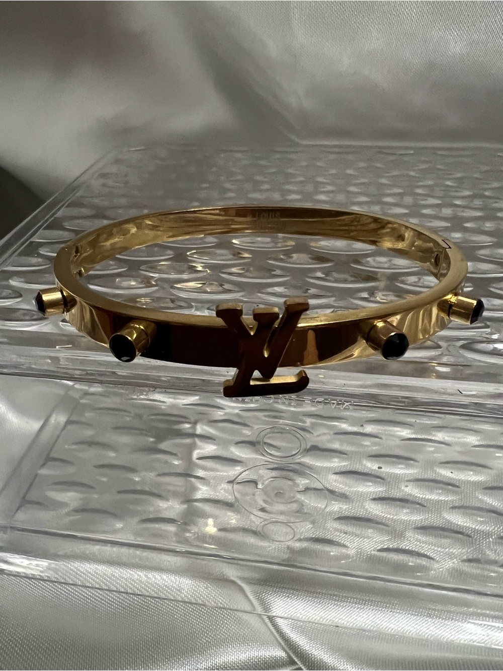 Gold-Tone Logo Bangle Bracelet with Black Accents